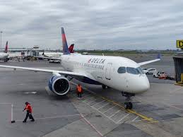 The seats of the 1st row have several remarks such as: A220 Delta First Class Flight Review Boston To New York Business Insider