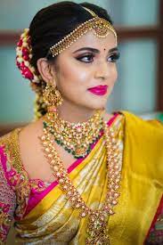 An Elegant Chennai Wedding With Stunning Decor And A Bride In Gorgeous Outfits Indian Bridal Makeup Indian Bride Makeup Indian Wedding Makeup