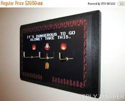 The Legend Of Zelda It S Dangerous To Go Alone On Sale Legend Of Zelda Key Hanger Completed Key Hook Three Hook Version It S Dangerous Link Gamer Decor Zelda Gifts Zelda Diy Legend Of Zelda