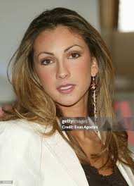 Katrina Campins, cast member from TV's "The Apprentice", signs copies...  News Photo