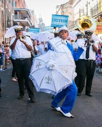 New Orleans Second Line Parade History And Traditions Second Line Parade French Quarter Festival New Orleans