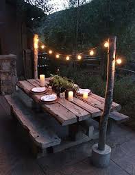 eclairage terrasse bois lanterne exterieur lumiere jardin idee luminaire pas cher spots led sol guirl outdoor deck lighting backyard picnic fairy lights garden