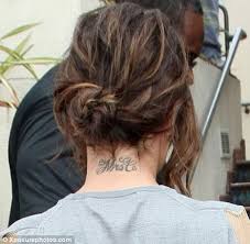 Cheryl cole got this little swirl tattoo on the center of her chest from artist nikko hurtado in april 2016. My Kids Initials