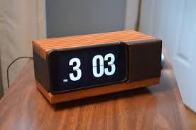This general electric alarm clock/radio has an attractive light walnut grain shell with shop at dormco for our retro analog flip alarm clock! Iphone Made Into A Classic Flip Number Alarm Clock New Mission Workshop