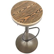 Made with a black matte base and distressed wood top. Dakota Antique Bronze Adjustable Industrial Modern Swivel Barstool At Home