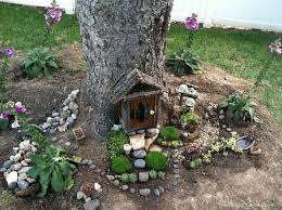 Kid Friendly Tree Trunk Fairy Garden Finalist In 2014 Fairy Garden Contest Www Themagiconions Com Fairy Garden Fairy Garden Diy Fairy Garden Houses
