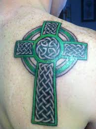 Irish crosses might also incorporate a series of celtic knots, dragons or serpents and weaponry. Pin On Tats