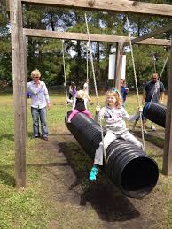 Tube Swing You Can Swing And Crawl Thru Backyard Play Kids Playground Backyard Playground