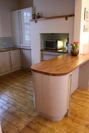 Curved overhangs, island structures and more. Island Unit Breakfast Bar With Curved Doors Open Kitchen And Living Room Breakfast Bar Open Kitchen
