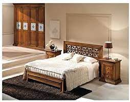Trittico camera da letto noce massello con cassetti a coda di rondine, incisioni e decori in oro, maniglie con pendolo e borchia con incisione. Estea Mobili Letto Matrimoniale Colore Noce Intagliato A Mano Legno Massello 024 2 Come Foto Amazon It Casa E Cucina