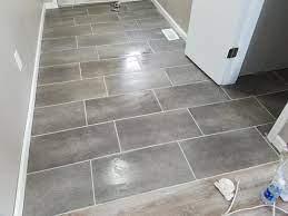 Find trafficmaster ceramica upc & barcode, including barcode image, product images, trafficmaster ceramica related product info and online shopping info. Trafficmaster Ceramica 12 In X 24 In Coastal Grey Vinyl Tile Flooring 29 Sq Ft Case 24716 Vinyl Flooring Bathroom Bathroom Vinyl Best Bathroom Flooring