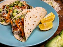 Place fish, lime juice, garlic, jalapeno, cumin, and salt in a bowl and toss to coat. Tilapia Fish Tacos Cucumber Jalapeno Relish
