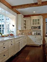 An Atlanta European Traditional Painted Kitchen With An Ivory Glaze Architect William T Baker Log Home Kitchens Log Cabin Kitchens Craftsman Style Kitchens