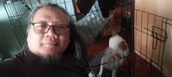 Hi all! I just wanted to introduce myself and share a photo I took of  Maggie (one of my rescued strays) and myself.