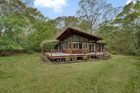 A shed house plan may have multiple roof planes, each sloping a different. Springs Modern Style Home With Slanted Roof Asks 995k Curbed Hamptons