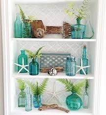 Coastal Shelf Decor Styling Idea With Glass Vases Featured On Completely Coastal Aquatic Glass Vases With An Oceanic Beach House Decor Decor Coastal Bedrooms