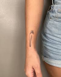 Small flower tattoos have become a great choice for women. Delicate Simple Line Flower Tattoo Novocom Top