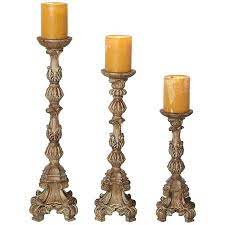 From whimsical animal candle holders to elegant filigree lanterns, there is this 11 inches tall modern cut glass pillar or taper candle holder is a sleek piece that will look stunning in the warm glow of any pillar or taper. Exotic Carved Pillar Candle Holders Set Of 3 U2744 Lamps Plus