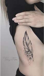 20 Idees De Tatouages Plumes Qui Nous Inspirent