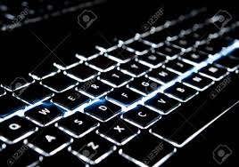 Keys On A Keyboard Are Backlight With A Blue Dash Of Light Running Stock Photo Picture And Royalty Free Image Image 3989255