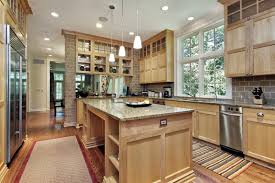 With that in mind, consider the proximity to windows, stovetops, and other layout features that may affect the cabinet coloring in the future. 17 Gorgeous Wood Kitchen Designs Art Of The Home
