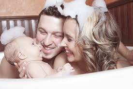 Helping baby enjoy bath time. Co Bathing Lansinoh