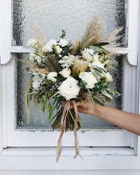 The wedding trend of pampas grass was popping up in 2017 and as far as we see it is getting even hotter in 2018. Pink Pampas Grass Bridal Bouquet Novocom Top