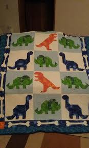 This pattern section has basic dinosaur patterns for applique, quilting or even clipart. Kids Dinosaur Quilt Dinosaur Quilt Quilts Boy Quilts
