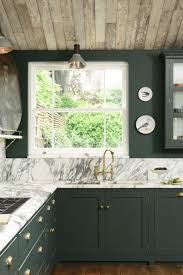 Bold Cabinets In A Green Similar To Roycroft Bottle Green Sw 2847 Rustic Wood Slat Ceilings Marbl Bohemian Kitchen Outdoor Kitchen Countertops Kitchen Marble