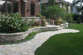 Retaining walls are installed for aesthetic reasons. Curved Retaining Wall Eclectic Garden Chicago By Krugel Cobbles Inc Houzz