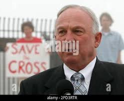 San Diego mayor Jerry Sanders speaks in front of the Mount Soledad Cross  during a news conference held Thursday, May 11, 2006 in San Diego. Sanders  annouced that he wants the city