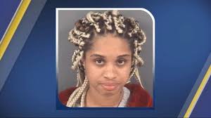 Woman runs stop sign, shoots at officer, Fayetteville Police say