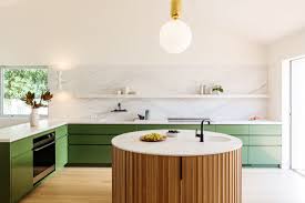 There are so many kitchen cabinet types to emerald green is just a huge color trend in general, but it makes a kitchen look dynamic as well as dramatic. Photo 10 Of 21 In My House An Architect Couple S Playful Courtyard In 2021 Kitchen Design Round Kitchen Island Green Cabinets
