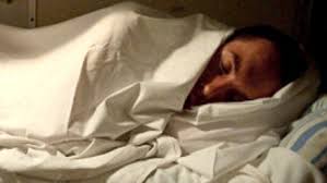 Image result for picture of a man sleeping on a bed