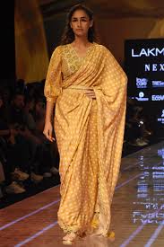 Mustard Embellished Bandhani Saree Set Design By Punit Balana At Pernia S Pop Up Shop Punit balana and sva couture collections featured traditional indian and mughal style designs as well as persian prints with a twist. punit balana