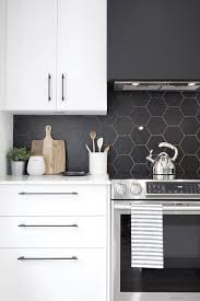 Are you bold enough to play with patterned tile in your kitchen? 25 Edgy And Catchy Black Kitchen Backsplashes Digsdigs