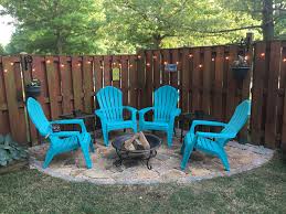 Diy Flagstone Patio Complete With A Fire Pit Cafe Lights And Adirondack Chairs Flagstone Patio Fire Pit And Adirondack Chairs Stone Patio Designs