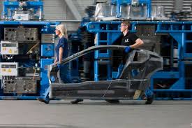 Morgan have been hand building the 44 for 80 years. Bmw Plant Landshut New Innovation And Production Centre For Cfrp Employees Carry A Bmw I8 Side Frame 06 2014