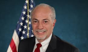 Art teacher unimpressed with cost increase for after school care for  teacher's kids