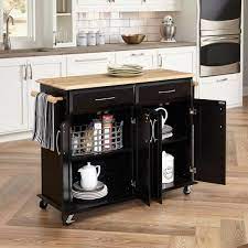 The modern look of yamazaki is meant to match your home decor. Homestyles Dolly Madison Black Kitchen Cart With Natural Wood Top 4528 95 The Home Depot Rolling Kitchen Island Kitchen Island Cabinets Kitchen Island Cart