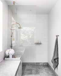 Tile Tuesday This Would Have To My Favorite Tile Design Trend At The Moment Deep Grey Stone Lo Stone Tile Bathroom Bathroom Tile Designs Room Tiles Design