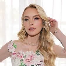 Lindsay Lohan is already setting the tone with her press tour wardrobe for  Freakier Friday and spoiler: it's blooming. Take a look at the link in the  comments below.