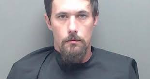 Marshall man indicted for fatal stabbing of mother; woman indicted for  shootout with police