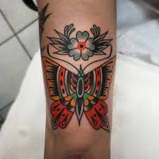 Japanese color butterfly tattoo on back. Traditional Tattoo Ideas Meanings Anchors Daggers Flash Ships More