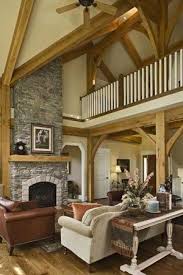 The Post And Beam Home Great Room With Its Vaulted Ceilings And Generous Windows Boasts Views To The North And S Timber Frame Homes Great Rooms Post And Beam