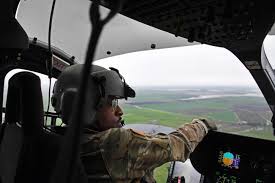 Army National Guard Chief Warrant Officer Shaun Hollins Pilots A Uh 72 Lakota Helicopter Over Merced County Army National Guard Warrant Officer National Guard