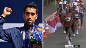 But whatever you might want to think, french runner morhad amdouni deliberate act of knocking over an entire row of water bottles at the hydration stations during the men's olympic marathon in tokyo on sunday has certainly sparked some controversy. Kzg Mhmvw449qm