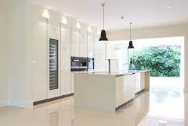 Bringing your cabinets to the ceiling depends on a lot of factors: Designed By Monita Cheung Modern Kitchen White Gloss Lacquer Units Floor To Ceiling Ki White Modern Kitchen Modern Kitchen Units Kitchen Appliances Design