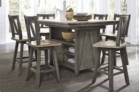 A modern and comfortable dining experience. Silverton Rustic Farmhouse Gray With Sandstone Top 7 Piece Gathering Table Set