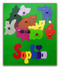 Personalized wooden name puzzles with easy to grip letters for fine motor skill development. 12 Wooden Name Puzzles With Pegs Ideas Wooden Names Name Puzzle Puzzles For Kids